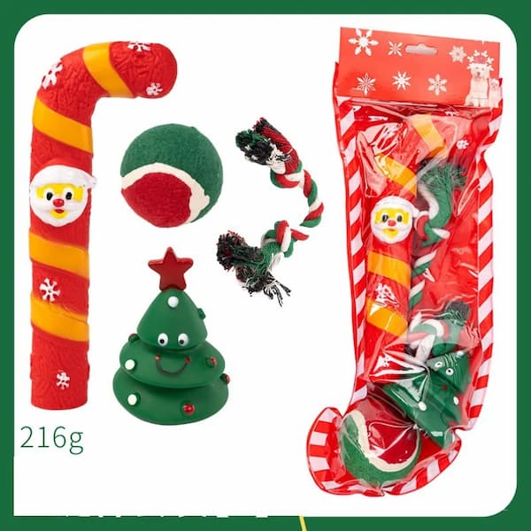 Dog toys including a candy cane, ball, and tree with packaging on a white background