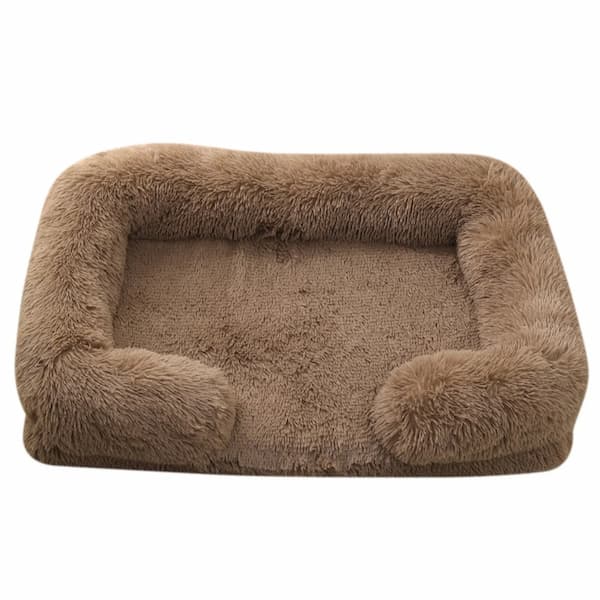 Brown plush pet bed on a white background
