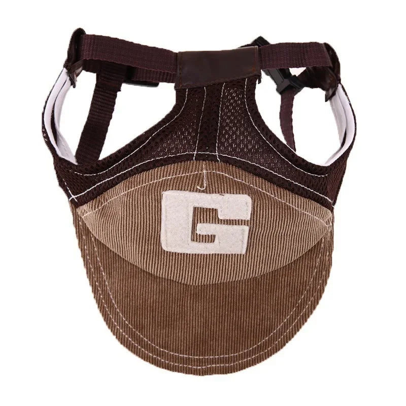 Brown dog sun protection hat with a visible brand logo on a white background