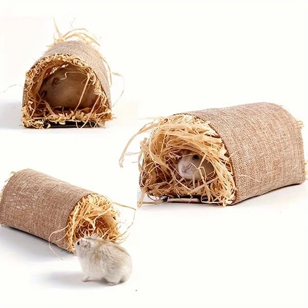 Three small animal hideouts made of burlap and straw on a white background