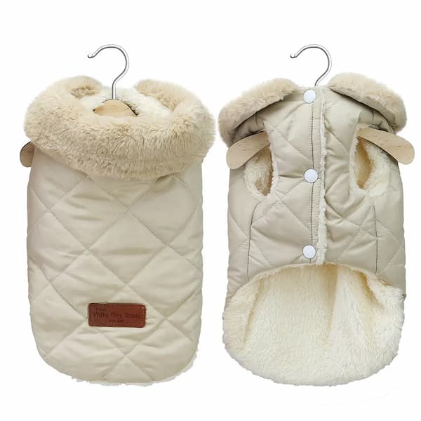 Two beige quilted dog coats with fur trim on hangers against a white background.