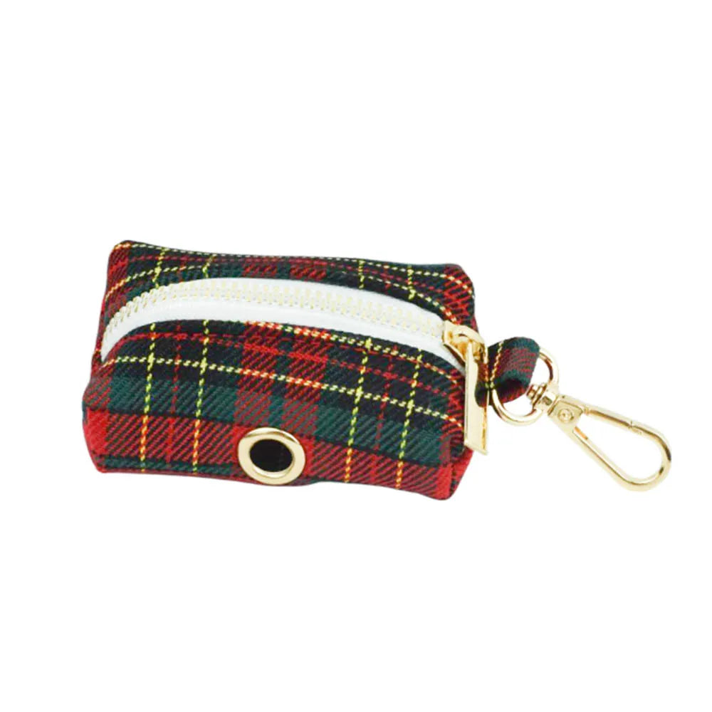 Plaid patterned keychain pouch with gold clasp on a white background