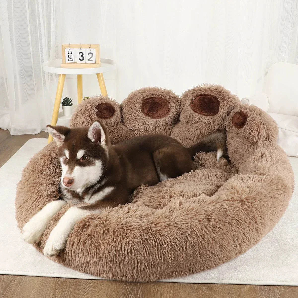 Large fluffy dog bed with raised edges, providing cozy comfort and support for pets in a soft, plush design.