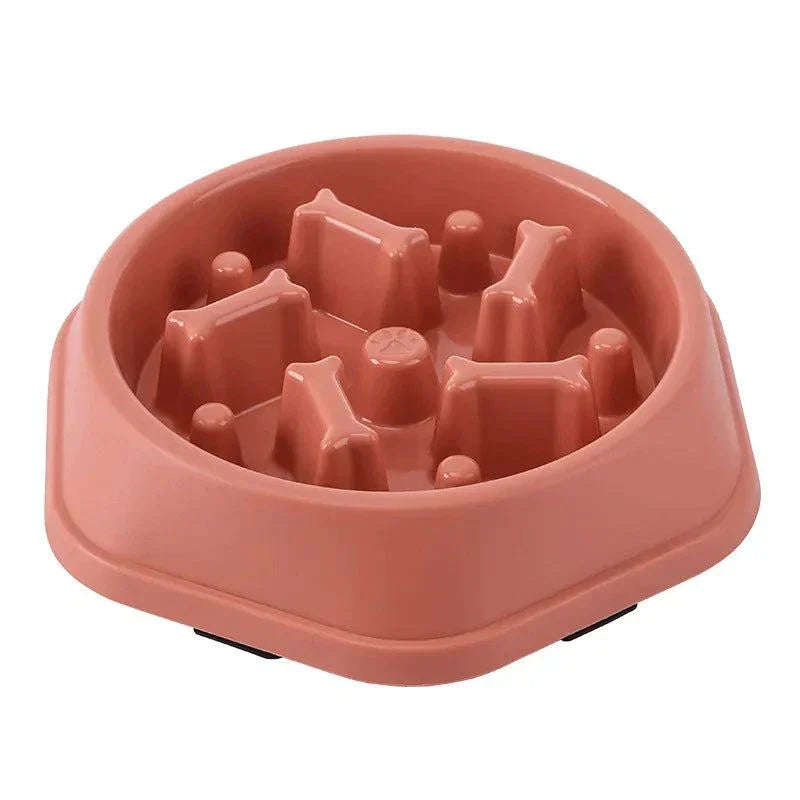 Anti-choking slow feeding bowl for dogs and cats in pink, designed to promote healthy eating and reduce choking risks.