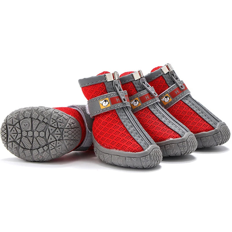 Red and gray pet boots with straps on a white background