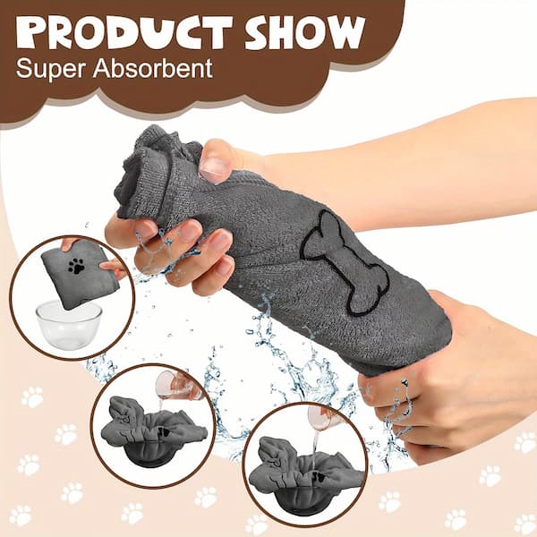 Gray dog towel with paw design being squeezed, surrounded by water droplets and paw prints on a beige background.