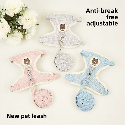 Three pet leashes in gray, pink, and blue with bear designs on a white background.