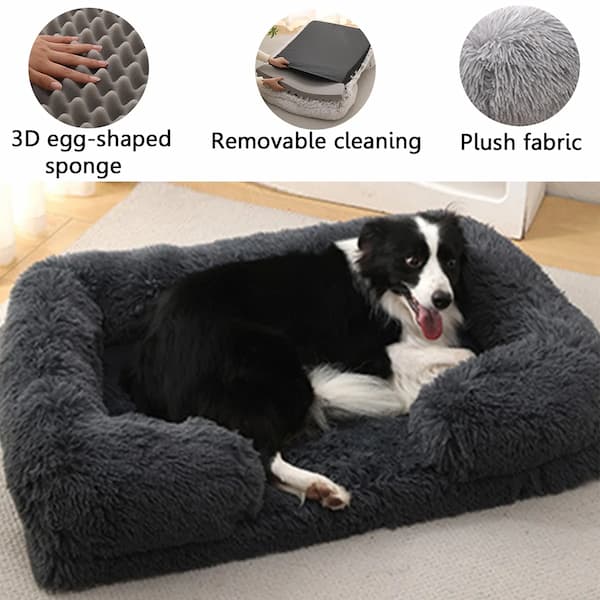 Dog lying on a plush gray pet bed with 3D egg-shaped sponge, removable cleaning cover, and plush fabric features highlighted.