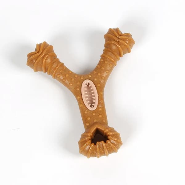 Brown dog chew toy with textured surface on a white background