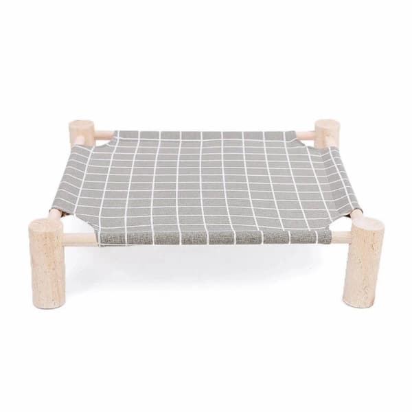 Pet hammock with grid pattern on a white background