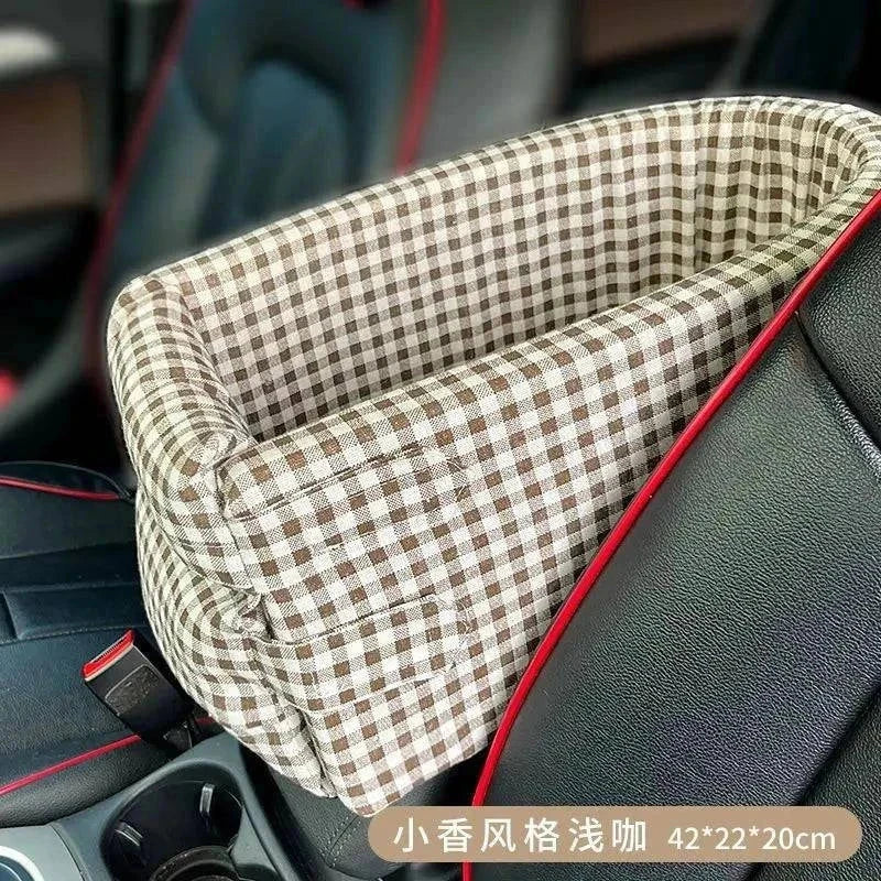 Portable dog car seat bed for small dogs and cats, checkered design, installed on car seat.