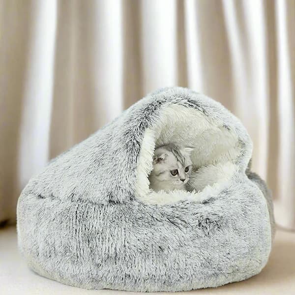 Cat resting inside a soft plush 2-in-1 cozy pet bed designed for warmth and comfort for cats and small dogs.