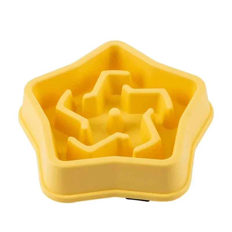 Yellow star-shaped slow feeding bowl for dogs and cats promoting healthy eating, anti-choking design.