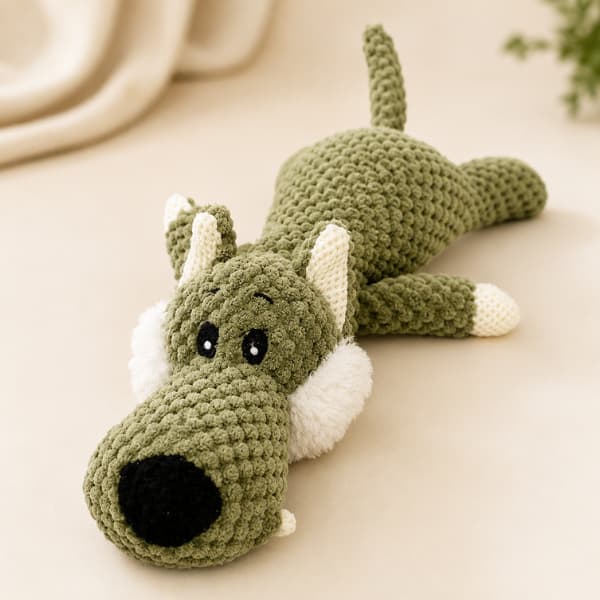 Soft crochet-style green crocodile dog toy designed for puppies and dogs for interactive play and comfort