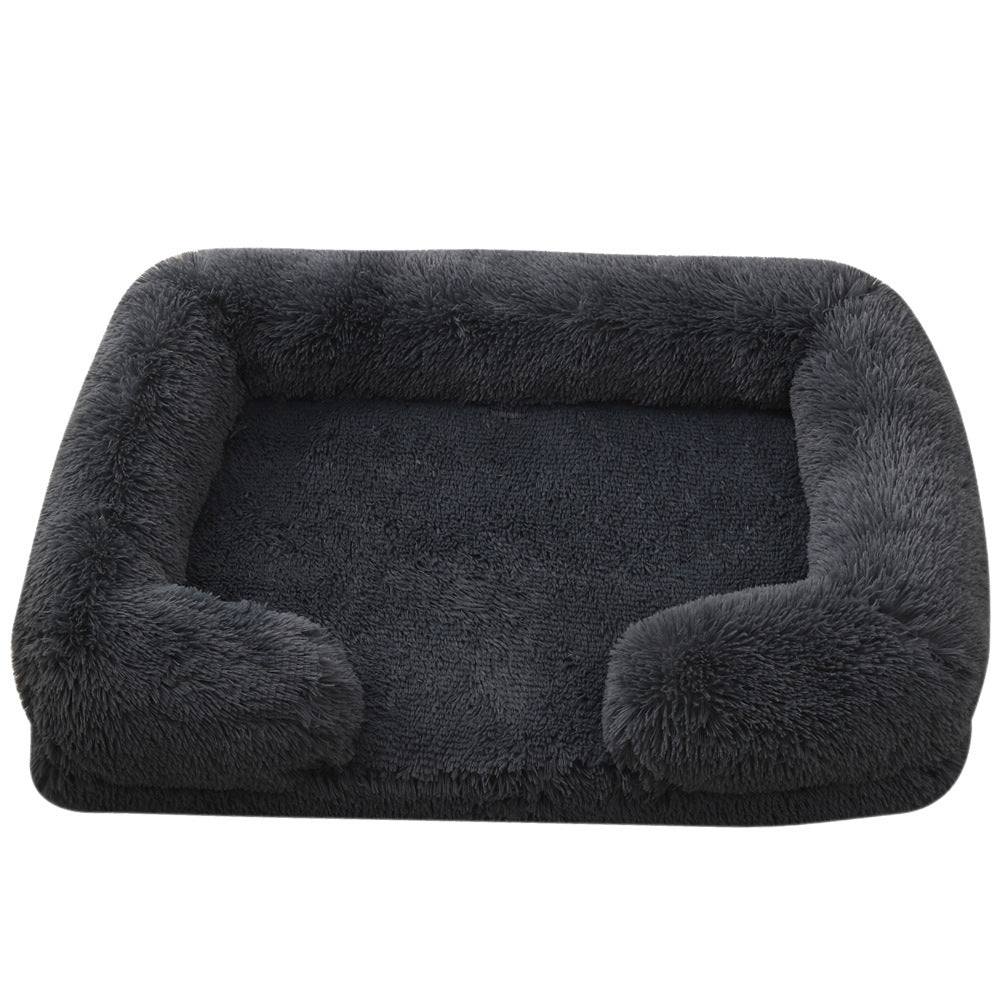 Cozy plush rectangle pet bed, perfect for winter warmth, designed for dogs of all sizes with a non-slip base and stylish look