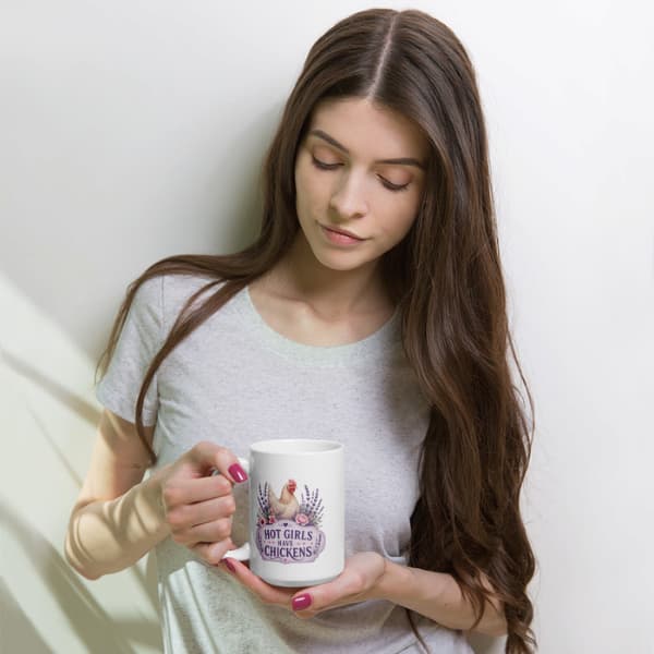 Hot Girls Have Chickens mug featuring a lavender farmhouse chicken design with floral accents on a white ceramic coffee cup.