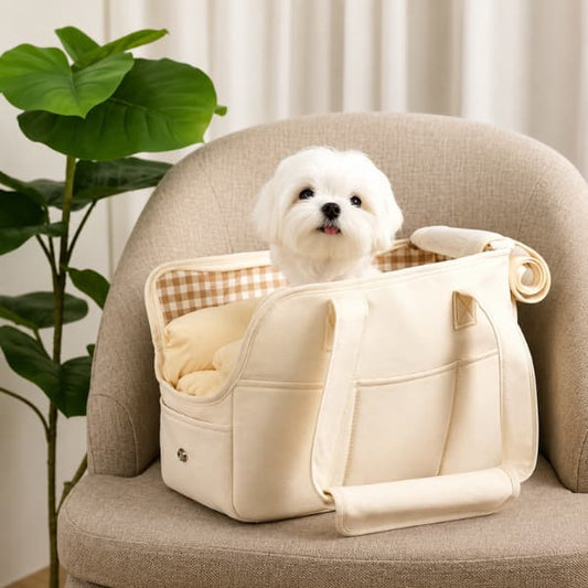 Luxury soft pet carrier bag for small dogs featuring a fluffy white puppy sitting comfortably inside a premium neutral travel carrier
