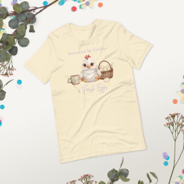 Powered by Coffee and Fresh Eggs chicken lover t-shirt flat lay with cute chicken illustration