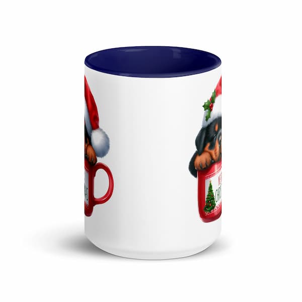 Festive Christmas mug featuring a cute Rottweiler puppy in a Santa hat inside a red cup with Christmas tree design – perfect holiday gift for dog lovers.