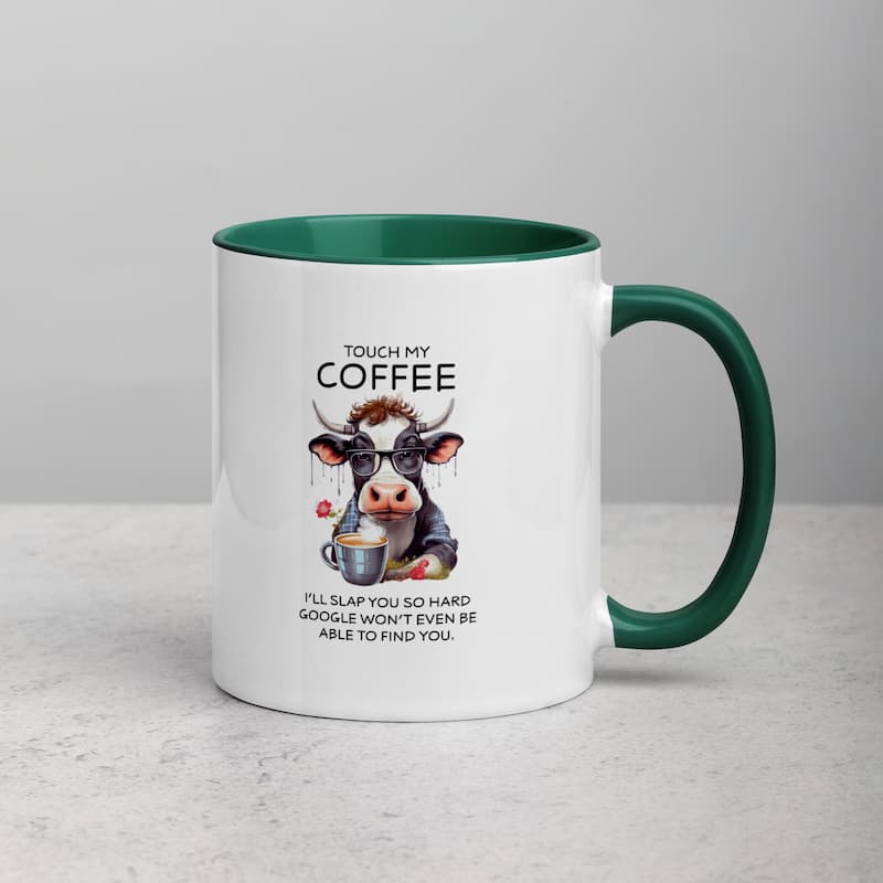 White ceramic mug with black handle featuring a funny cow illustration, glasses, and coffee cup with the quote 'Touch My Coffee – I’ll slap you so hard Google won’t even be able to find you'.