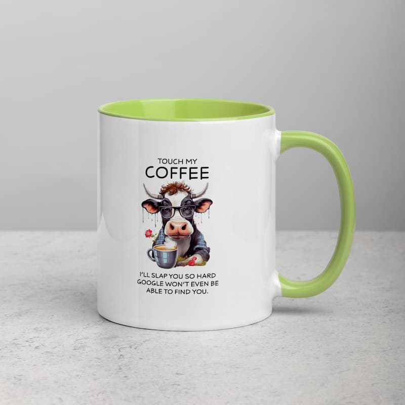 White ceramic mug with black handle featuring a funny cow illustration, glasses, and coffee cup with the quote 'Touch My Coffee – I’ll slap you so hard Google won’t even be able to find you'.