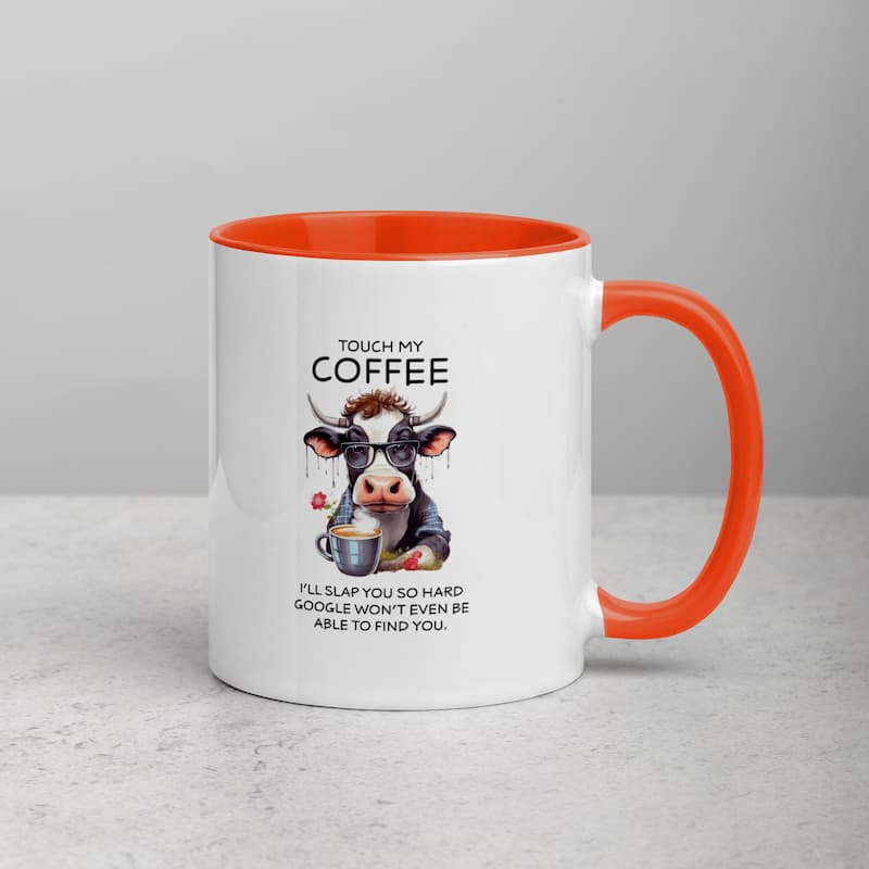 White ceramic mug with black handle featuring a funny cow illustration, glasses, and coffee cup with the quote 'Touch My Coffee – I’ll slap you so hard Google won’t even be able to find you'.