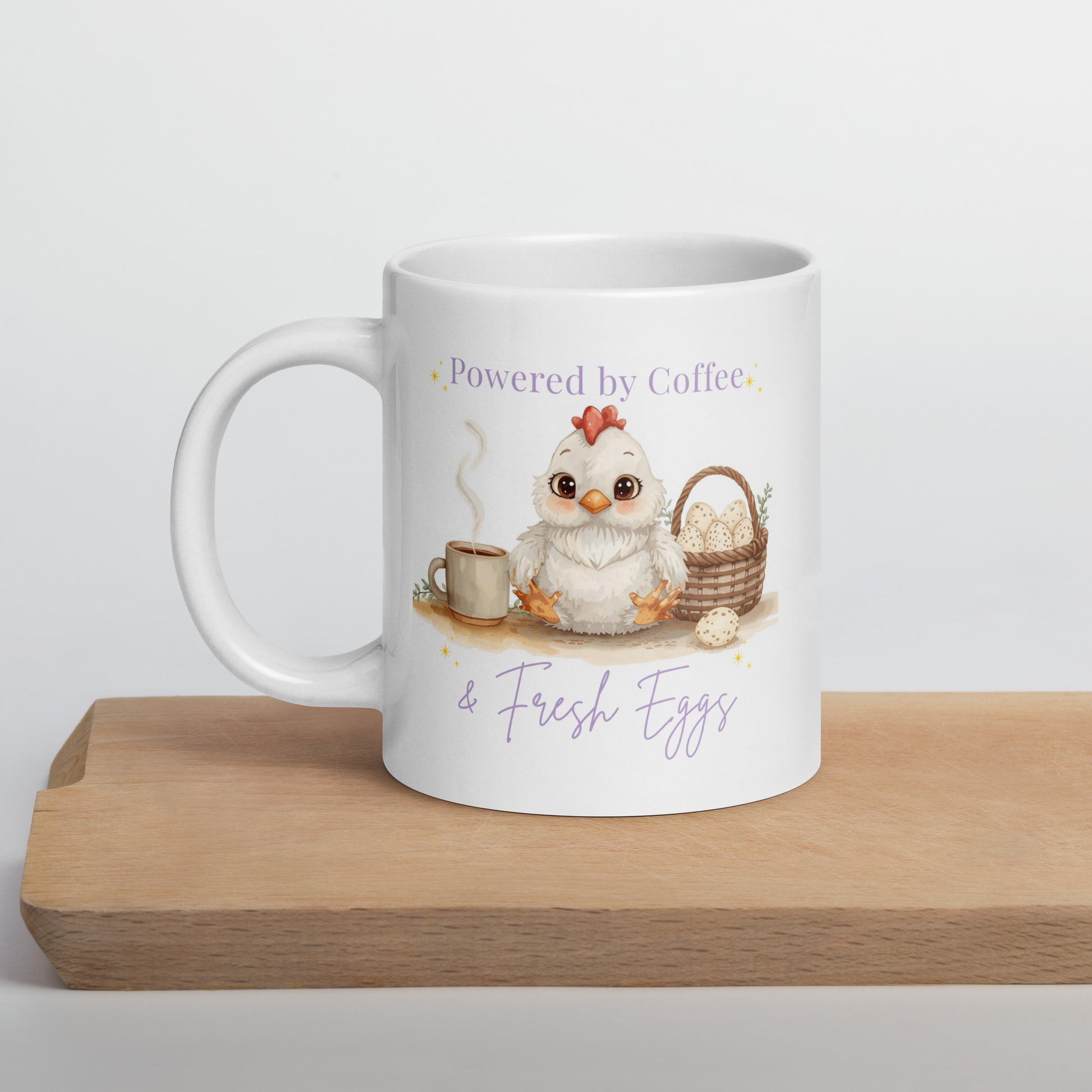 Cute chicken lover coffee mug with “Powered by Coffee & Fresh Eggs” design featuring an adorable hen, coffee cup and egg basket on a white ceramic mug.