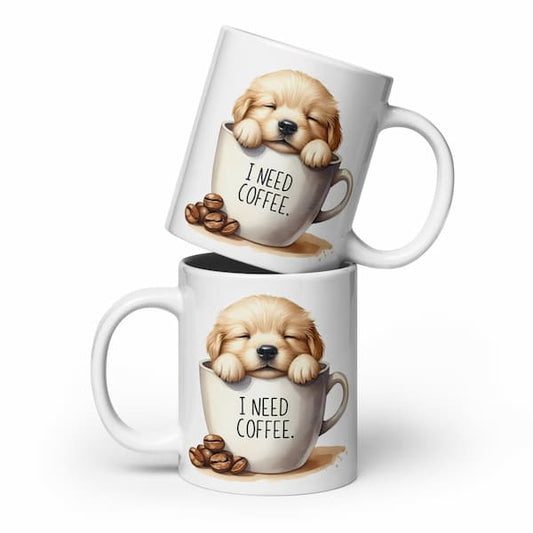 Two white mugs with a puppy design and 'I Need Coffee' text on a white background